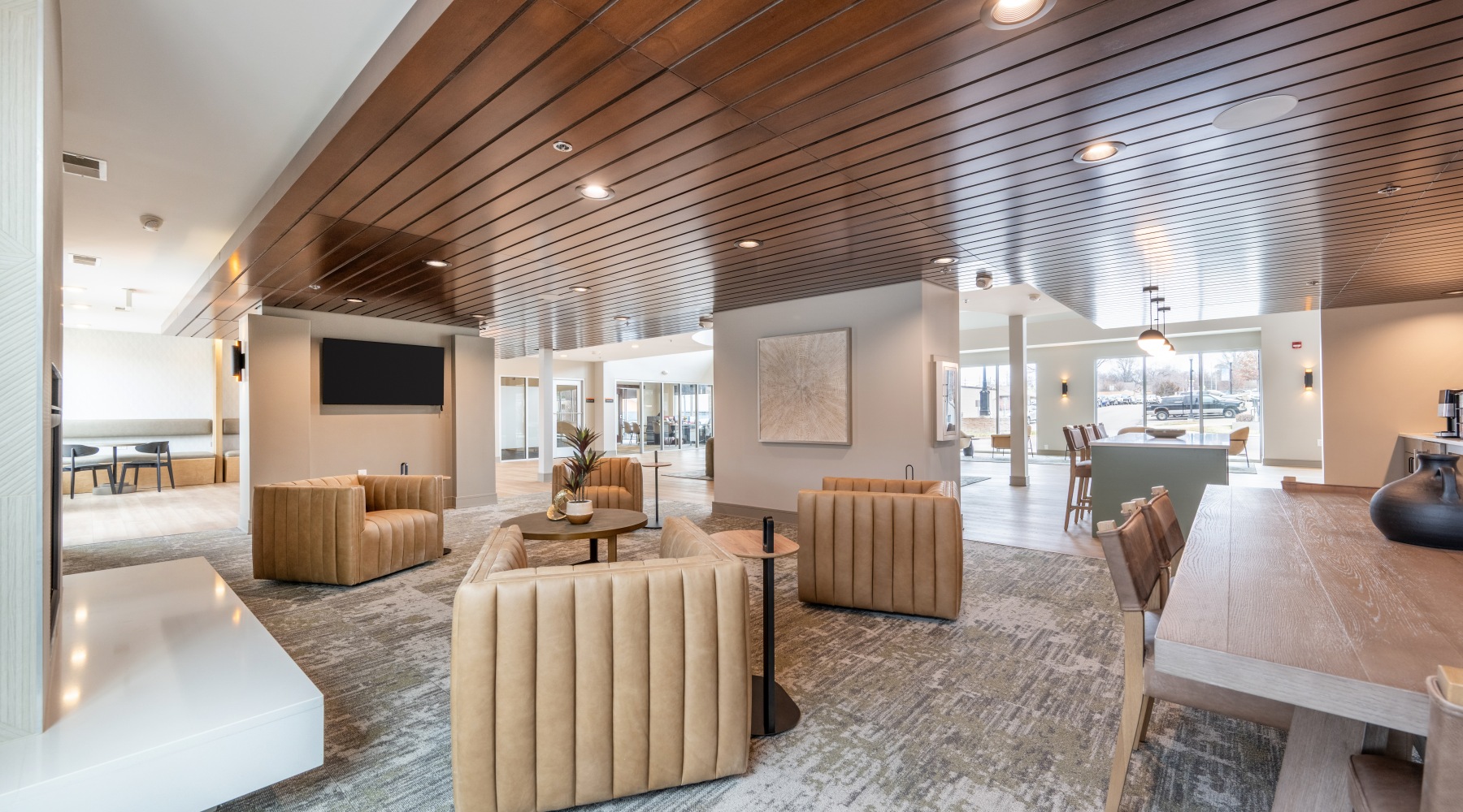 Community space with tv and chairs