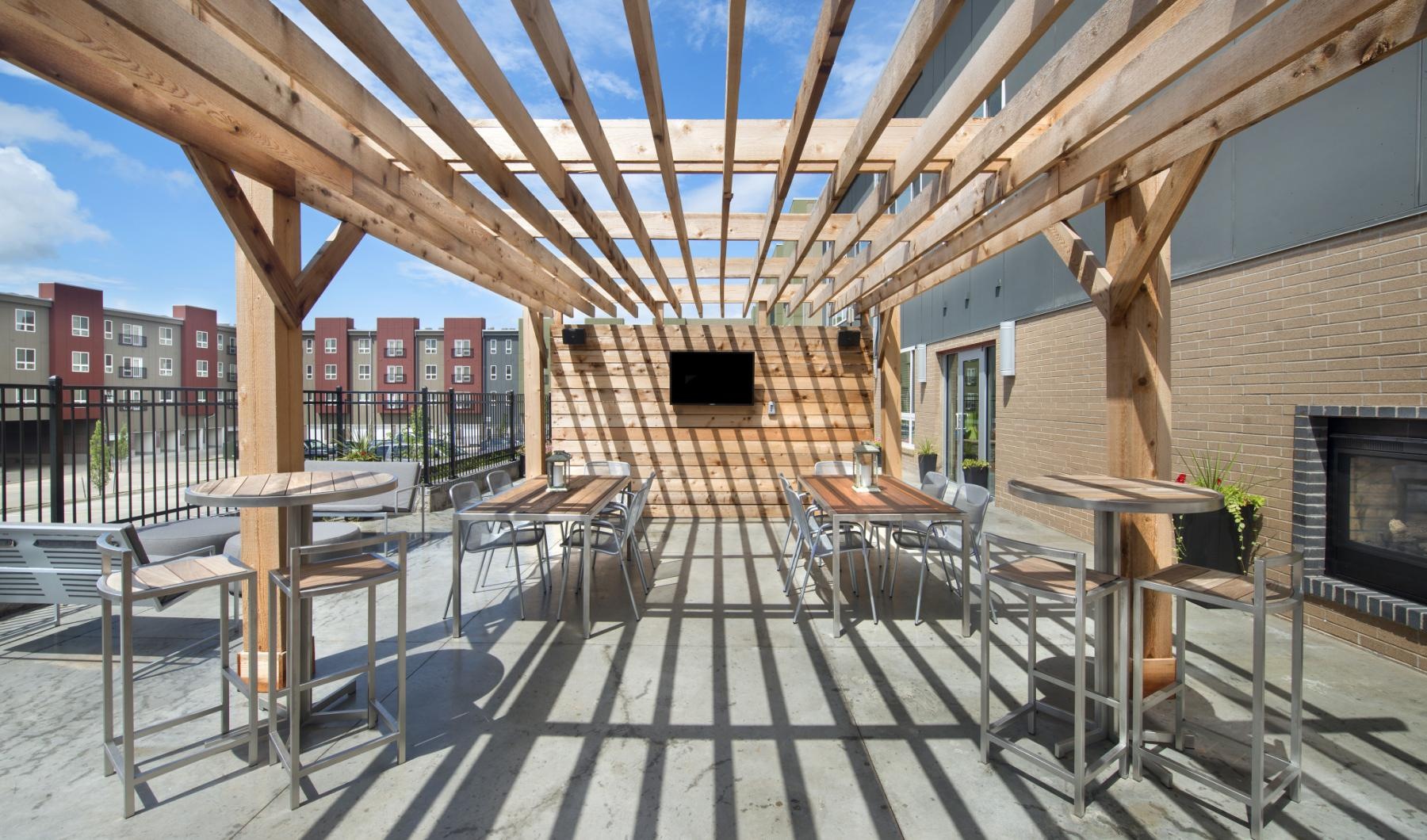 Find your perfect fit at The Heights at Linden Square a patio with tables and chairs