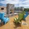 a patio with chairs